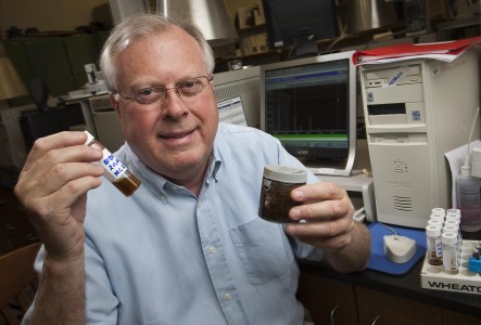 Edward B. Overton, Professor Emeritus, Environmental Sciences, LSU shows samples Saturday, June 19, 2010 of crude oil from the Mississippi Canyon 252 (Deepwater Horizon) oil spill at a lab at the Coastal Studies Institute at Louisiana State University in Baton Rouge, La. Researchers analyze the composition of the oil to see how the oil is changing. (AP Photo/Tim Mueller)